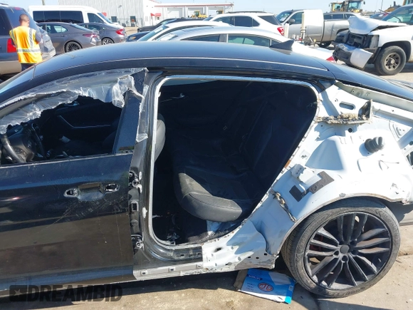 2018 Kia Stinger with VIN KNAE15LA5J6031079, listed as a IAAI auction lot 41137507 with 82,911 mi miles and . Bid and sale history available at DreamBid. Image 6.