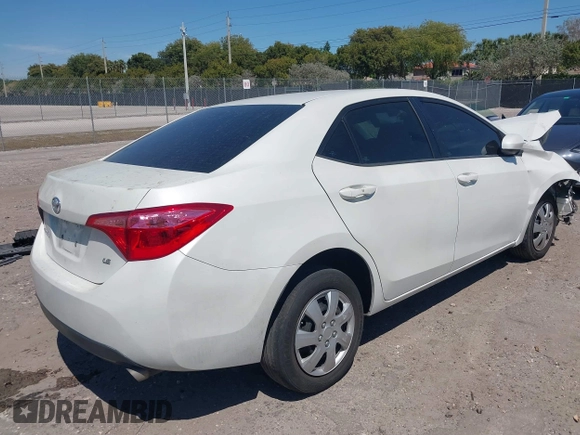 2019 Toyota Corolla L with VIN 5YFBURHE0KP882524, listed as a IAAI auction lot 41862382 with 84,981 mi miles. Bid and sale history available at carsss.com. Image 4.