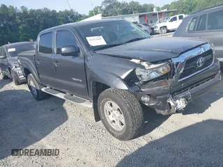 2011 Toyota Tacoma PreRunner z VIN 5TFJU4GN4BX004970, wystawiony jako IAAI lot #42221646 z przebiegiem 212 985 mil mil oraz . Historia ofert i sprzedaży dostępna na DreamBid. Obrazek 1.