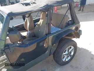 2002 Jeep Wrangler Sport with VIN 1J4FA49S52P760173, listed as a IAAI auction lot 42468550 with 201,682 mi miles and . Bid and sale history available at DreamBid. Image 6.