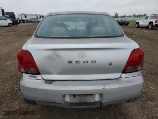 2000 Toyota ECHO with VIN JTDBT1231Y0061141, listed as a Copart auction lot 70341644 with 163,718 mi miles and Salvage Title. Bid and sale history available at carsss.com. Image 6.