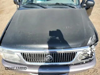 1997 Mercury Mountaineer with VIN 4M2DU55P5VUJ62435, listed as a Copart auction lot 60163465 with 105,646 mi miles and Salvage title. Bid and sale history available at DreamBid. Image 12.