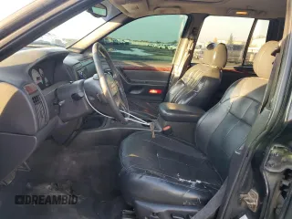 2001 Jeep Grand Cherokee Limited with VIN 1J4GX58S01C652737, listed as a Copart auction lot 81635494 with 175,498 mi miles and Salvage Title. Bid and sale history available at DreamBid. Image 7.