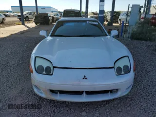 1995 Mitsubishi 3000GT VR-4 z VIN JA3AN74KXSY031947, wystawiony jako Copart lot #82468544 z przebiegiem 163 879 mil mil oraz Szkoda całkowita • Salvage title. Historia ofert i sprzedaży dostępna na DreamBid. Obrazek 5.