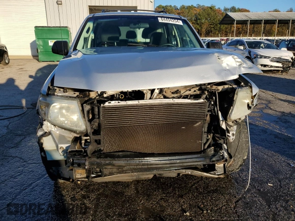 2010 Mazda Tribute Grand Touring with VIN 4F2CY0C74AKM03659, listed as a Copart auction lot 84494254 with 160,177 mi miles and Salvage Title. Bid and sale history available at carsss.com. Image 5.