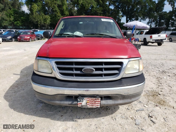 2003 Ford F-150 XL with VIN 1FTRX07WX3KD51374, listed as a Copart auction lot 71796464 with 130,319 mi miles and Salvage Title. Bid and sale history available at carsss.com. Image 5.