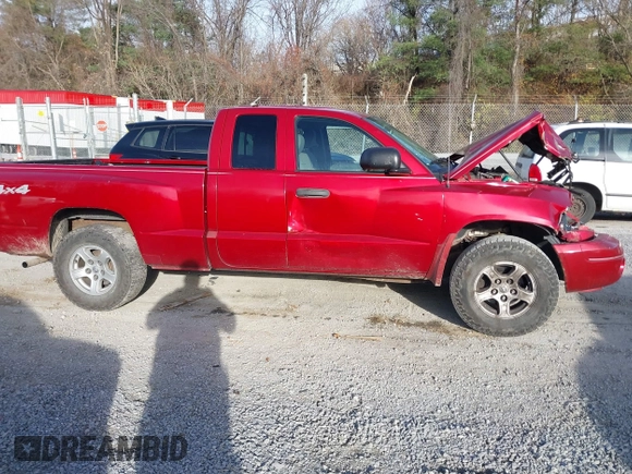 2006 Dodge Dakota SLT with VIN 1D7HW42N16S525329, listed as a IAAI auction lot 40920101 with 124,535 mi miles and . Bid and sale history available at carsss.com. Image 13.