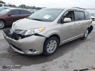 2015 Toyota Sienna XLE with VIN 5TDYK3DC3FS536689, listed as a IAAI auction lot 41432930 with 97,842 mi miles. Bid and sale history available at carsss.com. Image 22.