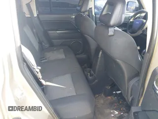 2009 Jeep Patriot Sport with VIN 1J4FT28B69D124812, listed as a IAAI auction lot 41437621 with 118,250 mi miles. Bid and sale history available at carsss.com. Image 8.