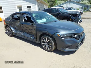 2023 Honda Civic Sedan EX with VIN 2HGFE1F71PH324023, listed as a IAAI auction lot 39256308 with 6,451 mi miles. Bid and sale history available at carsss.com. Image 1.