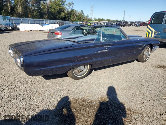 1965 Ford Thunderbird with VIN 5Y85Z115781, listed as a Copart auction lot 82289124 with 75,677 mi miles and Salvage Title. Bid and sale history available at DreamBid. Image 3.