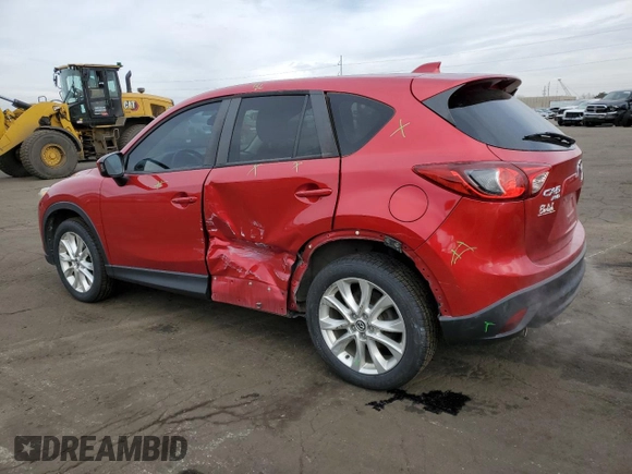 2014 Mazda CX-5 Grand Touring with VIN JM3KE4DY5E0360896, listed as a Copart auction lot 43978975 with 113,942 mi miles and Salvage Title. Bid and sale history available at carsss.com. Image 2.