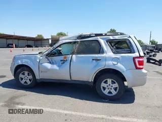2011 Ford Escape Hybrid with VIN 1FMCU4K33BKB53300, listed as a IAAI auction lot 42561682 with 144,628 mi miles and . Bid and sale history available at DreamBid. Image 14.