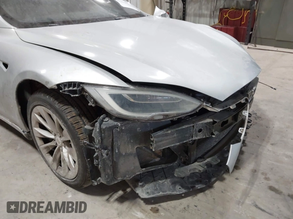 2017 Tesla Model S 100D with VIN 5YJSA1E23HF232059, listed as a IAAI auction lot 41394046 with 84,052 mi miles and . Bid and sale history available at DreamBid. Image 23.