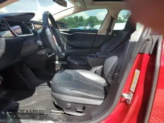 2014 Tesla Model S 60 z VIN 5YJSA1H19EFP27946, wystawiony jako Copart lot #61284625 z przebiegiem 109 147 mil mil oraz Szkoda całkowita • Salvage title. Historia ofert i sprzedaży dostępna na DreamBid. Obrazek 7.