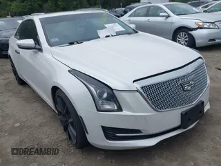 2016 Cadillac ATS Standard RWD with VIN 1G6AA1RXXG0189132, listed as a IAAI auction lot 42220193 with 72,532 mi miles and . Bid and sale history available at DreamBid. Image 1.