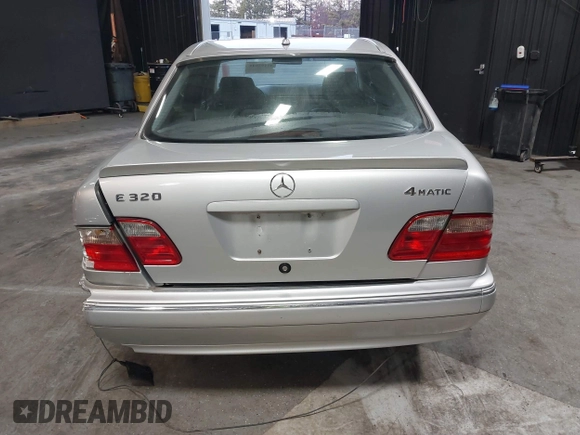 2002 Mercedes-Benz E-Class with VIN WDBJF82J52X062526, listed as a IAAI auction lot 41192641 with 126,352 mi miles. Bid and sale history available at carsss.com. Image 16.