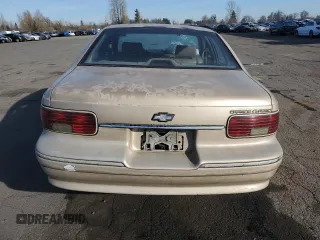 1995 Chevrolet Caprice z VIN 1G1BL52W8SR129349, wystawiony jako Copart lot #41795435 z przebiegiem Nie podano mil oraz Szkoda całkowita • Salvage title. Historia ofert i sprzedaży dostępna na DreamBid. Obrazek 6.