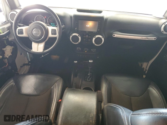 2015 Jeep Wrangler Unlimited Sahara with VIN 1C4BJWEG2FL620001, listed as a Copart auction lot 63914725 with 114,810 mi miles and Salvage title. Bid and sale history available at DreamBid. Image 8.