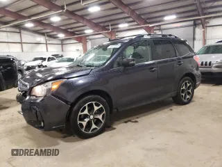 2014 Subaru Forester XT Touring with VIN JF2SJGMC0EH517859, listed as a Copart auction lot 46973505 with 117,907 mi miles and Salvage Title. Bid and sale history available at DreamBid. Image 1.