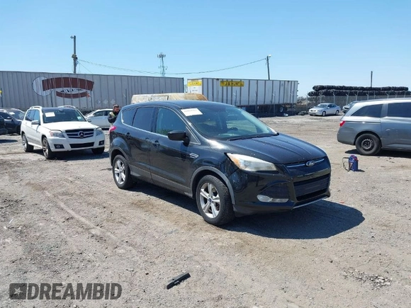 2015 Ford Escape SE with VIN 1FMCU9GX3FUC14020, listed as a IAAI auction lot 42069921 with 111,113 mi miles. Bid and sale history available at carsss.com. Image 1.