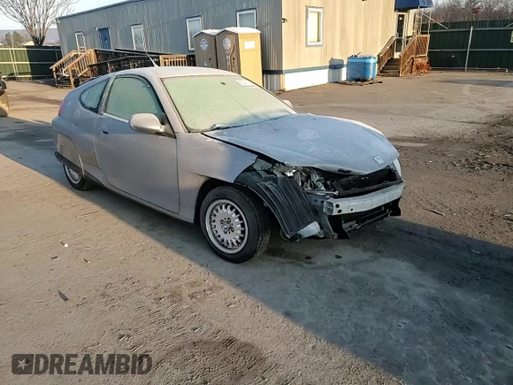 2000 Honda Insight z VIN JHMZE1371YT004249, wystawiony jako Copart lot #85041024 z przebiegiem 168 946 mil mil oraz Szkoda całkowita • Salvage title. Historia ofert i sprzedaży dostępna na DreamBid. Obrazek 11.