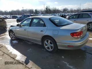 2002 Mazda Millenia z VIN JM1TA221921738582, wystawiony jako Copart lot #88500905 z przebiegiem 182 323 mil mil oraz Szkody całkowita. Historia ofert i sprzedaży dostępna na DreamBid. Obrazek 2.