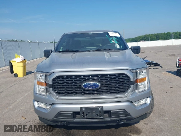 2022 Ford F-150 XL with VIN 1FTEX1EP3NFA65331, listed as a IAAI auction lot 42601392 with 21,187 mi miles and . Bid and sale history available at DreamBid. Image 13.