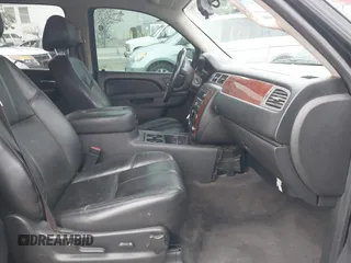 2013 Chevrolet Tahoe LT with VIN 1GNSKBE05DR152825, listed as a IAAI auction lot 41450863 with 157,305 mi miles and . Bid and sale history available at DreamBid. Image 5.
