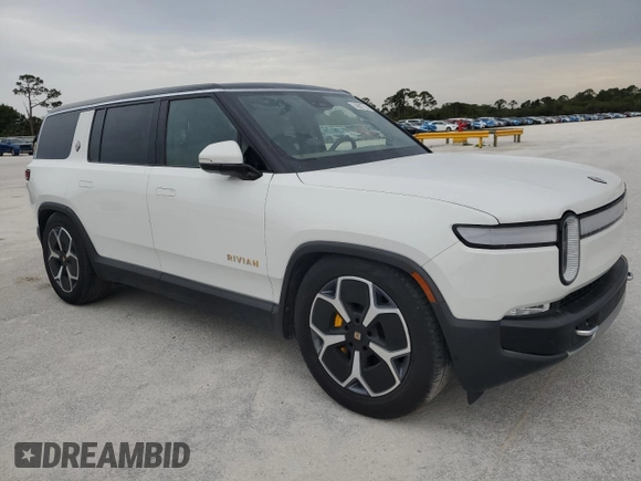 2023 Rivian R1S Adventure z VIN 7PDSGABA3PN024458, wystawiony jako Copart lot #74087714 z przebiegiem 3 505 mil mil oraz Nie do naprawy • Non repairable. Historia ofert i sprzedaży dostępna na DreamBid. Obrazek 4.