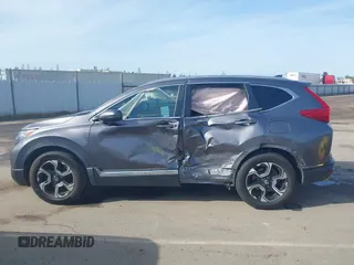 2018 Honda CR-V Touring with VIN 7FARW1H93JE027294, listed as a IAAI auction lot 41903484 with 80,999 mi miles and . Bid and sale history available at DreamBid. Image 15.