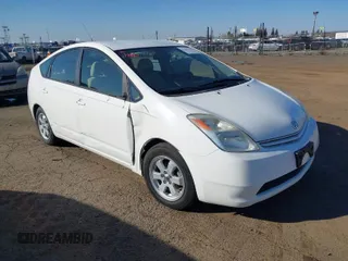 2005 Toyota Prius z VIN JTDKB20U153038165, wystawiony jako IAAI lot #41444718 z przebiegiem 135 356 mil mil oraz . Historia ofert i sprzedaży dostępna na DreamBid. Obrazek 1.