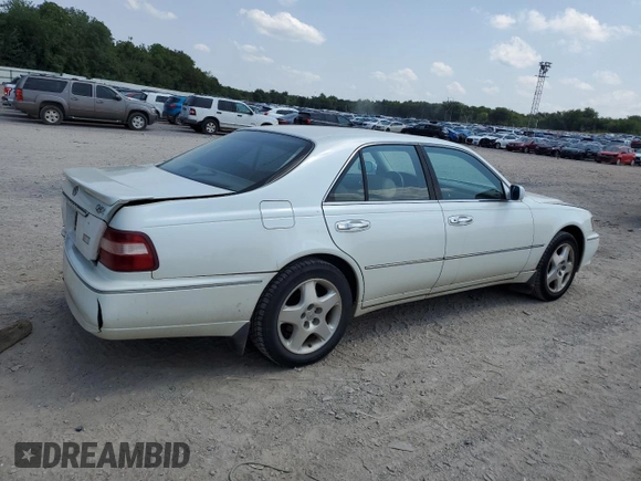 1999 Infiniti Q45 z VIN JNKBY31A2XM603477, wystawiony jako Copart lot #64216924 z przebiegiem 278 602 mil mil oraz Szkody całkowita. Historia ofert i sprzedaży dostępna na DreamBid. Obrazek 3.