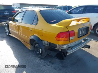 1997 Honda Civic EX z VIN 2HGEJ8646VH587451, wystawiony jako IAAI lot #42102826 z przebiegiem 13 144 mil mil oraz . Historia ofert i sprzedaży dostępna na DreamBid. Obrazek 3.