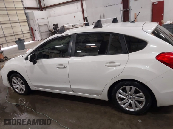 2015 Subaru Impreza Premium with VIN JF1GPAC64FH272292, listed as a IAAI auction lot 42189917 with 125,386 mi miles and . Bid and sale history available at DreamBid. Image 14.