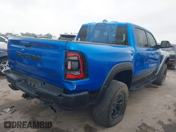 2021 Ram 1500 TRX with VIN 1C6SRFU91MN790158, listed as a IAAI auction lot 42115253 with 30,969 mi miles and . Bid and sale history available at DreamBid. Image 4.