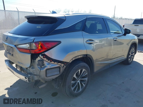 2020 Lexus RX with VIN 2T2AZMAA7LC173478, listed as a IAAI auction lot 41671494 with 91,777 mi miles. Bid and sale history available at carsss.com. Image 4.
