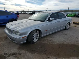 2004 Jaguar XJ with VIN SAJWA73B14TG24590, listed as a Copart auction lot 48438705 with 197,113 mi miles and Clean Title. Bid and sale history available at carsss.com. Image 1.
