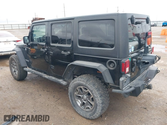 2012 Jeep Wrangler Unlimited Rubicon with VIN 1C4HJWFGXCL142804, listed as a IAAI auction lot 42183960 with 124,392 mi miles and . Bid and sale history available at DreamBid. Image 3.