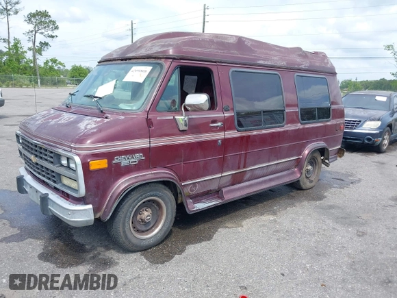 1994 Chevrolet Chevy Van z VIN 1GBEG25K4RF177057, wystawiony jako IAAI lot #42090808 z przebiegiem 123 654 mil mil oraz . Historia ofert i sprzedaży dostępna na DreamBid. Obrazek 2.