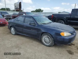 2001 Pontiac Grand Am SE1 with VIN 1G2NF52T31M547738, listed as a Copart auction lot 57442525 with 180,899 mi miles and Salvage title. Bid and sale history available at DreamBid. Image 4.