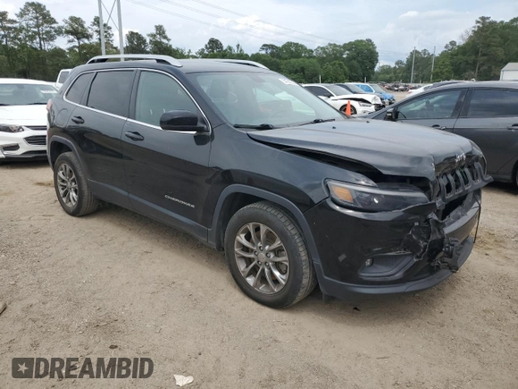 2019 Jeep Cherokee Latitude Plus with VIN 1C4PJLLB4KD344520, listed as a Copart auction lot 54535535 with 121,277 mi miles and Salvage Title. Bid and sale history available at DreamBid. Image 4.