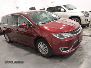2019 Chrysler Pacifica Touring Plus z VIN 2C4RC1FGXKR706264, wystawiony jako IAAI lot #41483658 z przebiegiem 86 823 mil mil oraz . Historia ofert i sprzedaży dostępna na DreamBid. Obrazek 1.