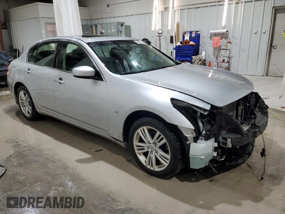 2015 Infiniti Q40 with VIN JN1CV6AR3FM651013, listed as a Copart auction lot 74568404 with 171,155 mi miles and Salvage Title. Bid and sale history available at carsss.com. Image 4.