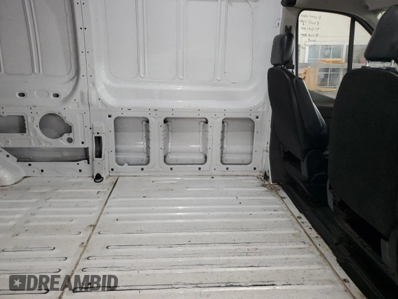 2023 Ford Transit Cargo with VIN 1FTBR3U89PKA70899, listed as a Copart auction lot 77940504 with 62,196 mi miles and Clean Title. Bid and sale history available at DreamBid. Image 11.