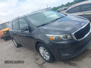 2015 Kia Sedona LX with VIN KNDMB5C16F6065437, listed as a IAAI auction lot 42079430 with 149,991 mi miles. Bid and sale history available at carsss.com. Image 1.