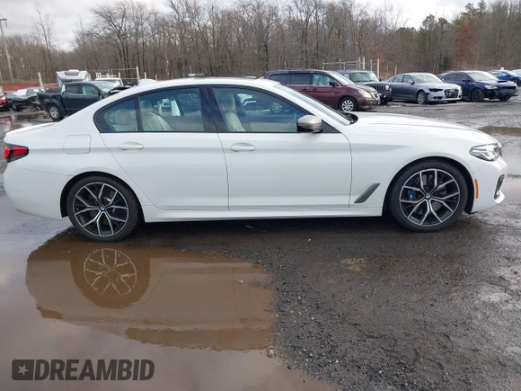 2021 BMW 5 Series M550i xDrive z VIN WBA13BK09MCF05866, wystawiony jako IAAI lot #41574859 z przebiegiem 37 822 mil mil oraz . Historia ofert i sprzedaży dostępna na DreamBid. Obrazek 13.