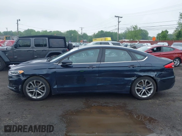2020 Ford Fusion SEL z VIN 3FA6P0CD9LR183400, wystawiony jako IAAI lot #42271491 z przebiegiem 52 020 mil mil oraz . Historia ofert i sprzedaży dostępna na DreamBid. Obrazek 17.
