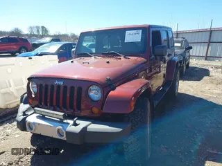 2008 Jeep Wrangler Unlimited Sahara с VIN 1J4GA59118L594851, выставлен на аукционе IAAI как лот 41643490 с пробегом 59 421 миль миль и . История ставок и продаж доступна на DreamBid. Изображение 18.