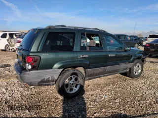 2001 Jeep Grand Cherokee Laredo with VIN 1J4GW48N21C570404, listed as a Copart auction lot 85996954 with 153,838 mi miles and Salvage Title. Bid and sale history available at carsss.com. Image 3.
